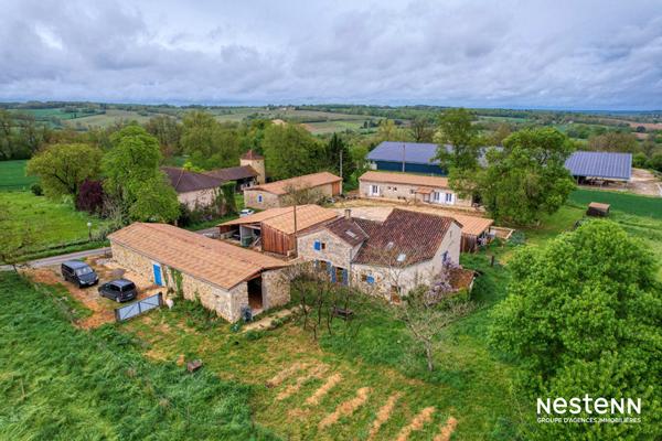 A Vendre Maison en pierre de 164 m² avec dépendance de 120 m² et grand terrain dans un hameau