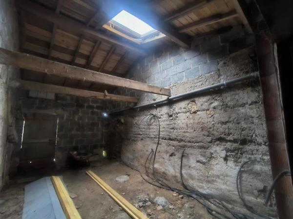 Maison de ville à fort potentiel pour petit budget