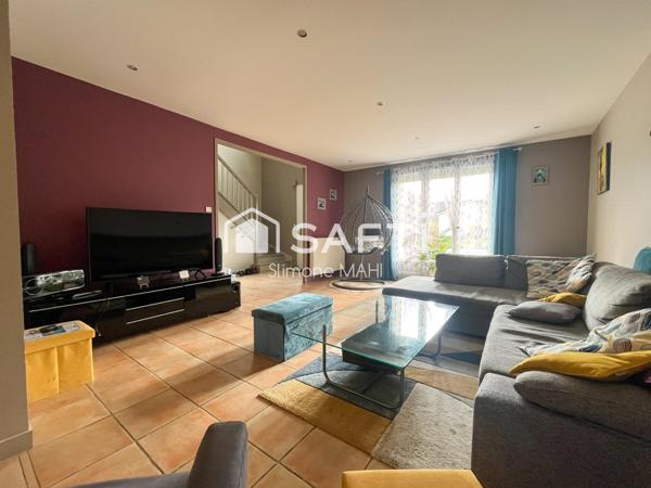 Maison familiale spacieuse d'environ 157m2 avec grand terrain, emplacement idéal à Saint-Saturnin.