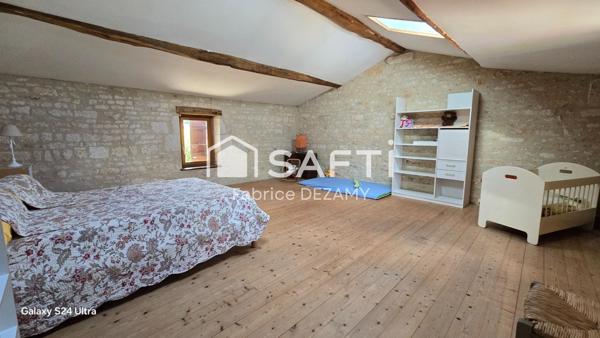 Bien de prestige en centre bourg.