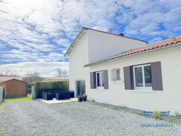 Maison de 2 habitations de 4 et 3 pièces avec grand stationnement