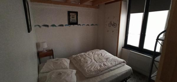 Appartement de 29m2 avec chambre indépendante et mezzanine dans bel immeuble 1900