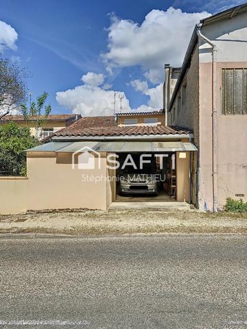 Maison centre village avec garage et cour