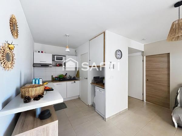Appartement en rez-de-jardin avec terrasse