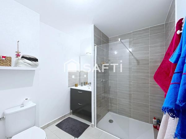 Appartement en rez-de-jardin avec terrasse