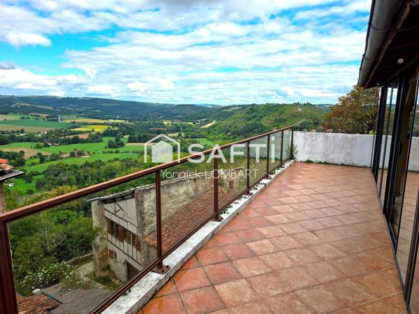 Immeuble (5 appartements) + un local commercial