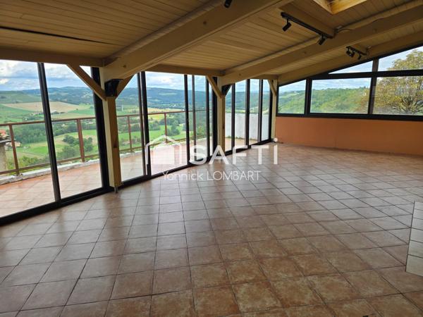 Immeuble (5 appartements) + un local commercial