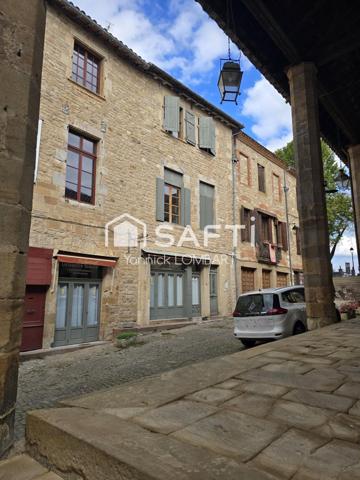 Immeuble (5 appartements) + un local commercial