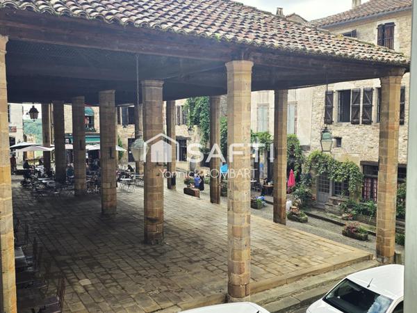 Immeuble (5 appartements) + un local commercial