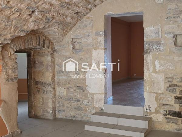 Immeuble (5 appartements) + un local commercial