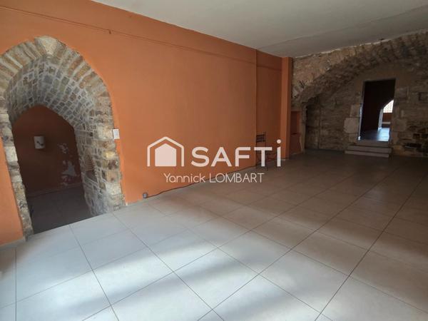 Immeuble (5 appartements) + un local commercial