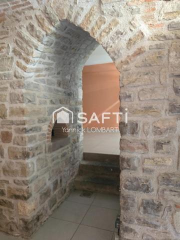 Immeuble (5 appartements) + un local commercial