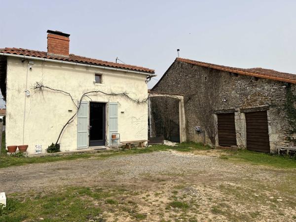 MAISON DE CHARME AVEC GRANGE ET TERRAIN A LA CAMPAGNE