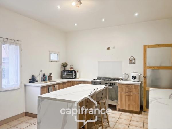 Charmante maison de village avec mur en pierre, 3 chambres, garage, jardin