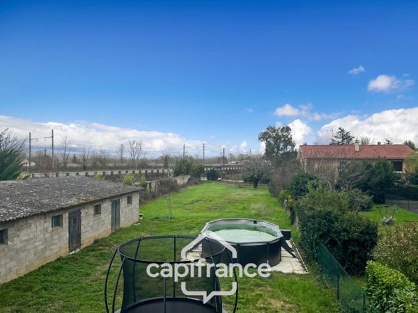 Charmante maison de village avec mur en pierre, 3 chambres, garage, jardin