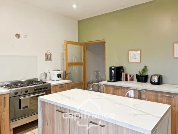 Charmante maison de village avec mur en pierre, 3 chambres, garage, jardin