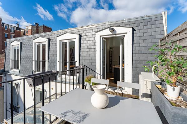 Duplex esprit loft avec terrasse et garage au dernier étage