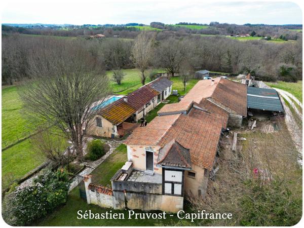 Propriete à vendre 6 pièces proche de BRANTOME (24), site en sommet de colline, clos de murs, piscine, annexe, dépendances