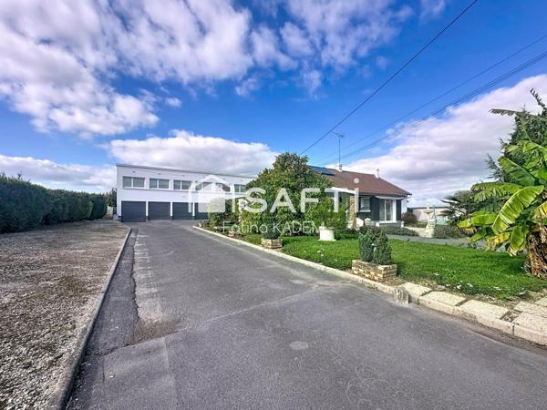 Maison de plain-pied atypique dans son écrin de verdure