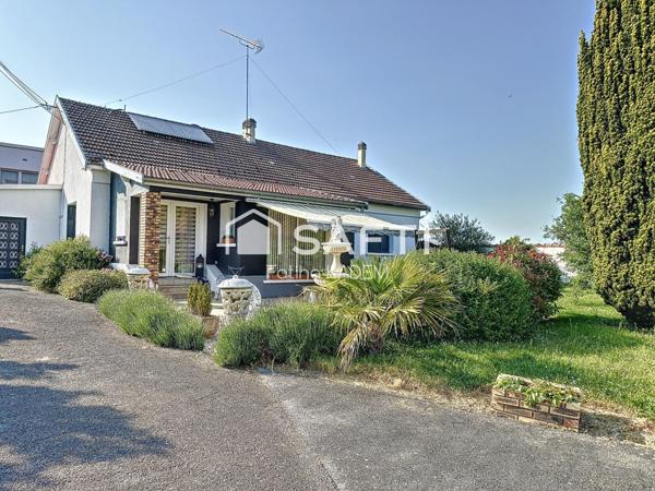 Maison de plain-pied atypique dans son écrin de verdure