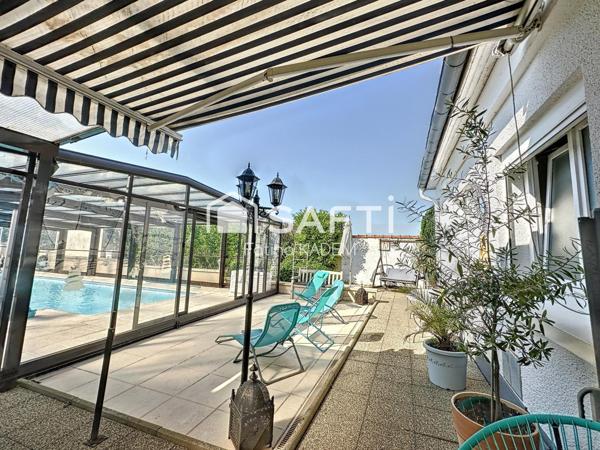 Maison de plain-pied atypique dans son écrin de verdure