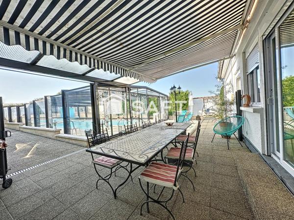 Maison de plain-pied atypique dans son écrin de verdure