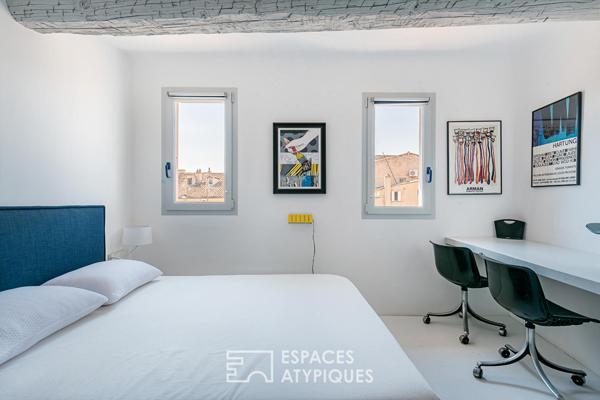 Duplex lumineux sur les toits du centre historique