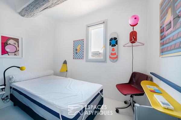 Duplex lumineux sur les toits du centre historique