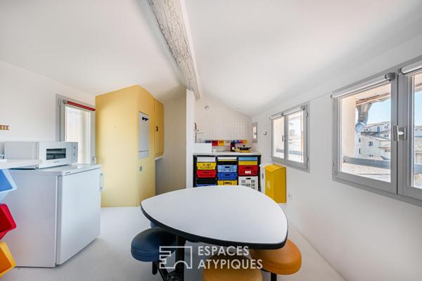 Duplex lumineux sur les toits du centre historique