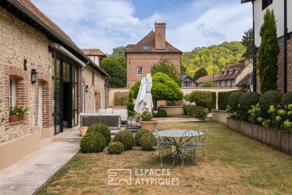 Ancien moulin à blé converti en atelier et maison rénovée