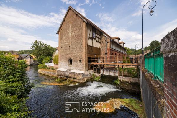 Ancien moulin à blé converti en atelier et maison rénovée