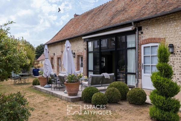 Ancien moulin à blé converti en atelier et maison rénovée