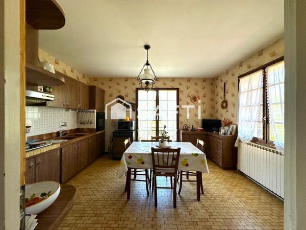 Propriété avec dépendance et grand terrain