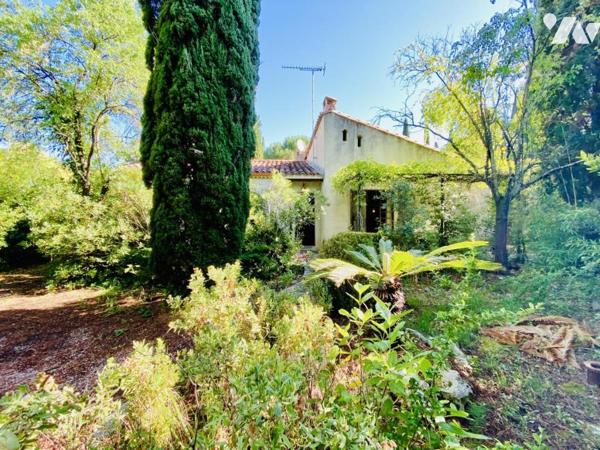 Maison T5 à rénover avec garage et jardin attenant