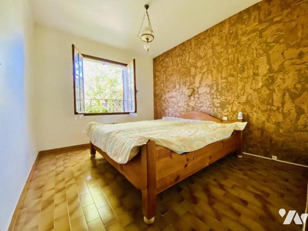 Maison T5 à rénover avec garage et jardin attenant