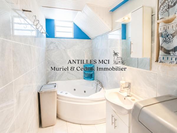 Villa créole rare calme avec rendement immédiat