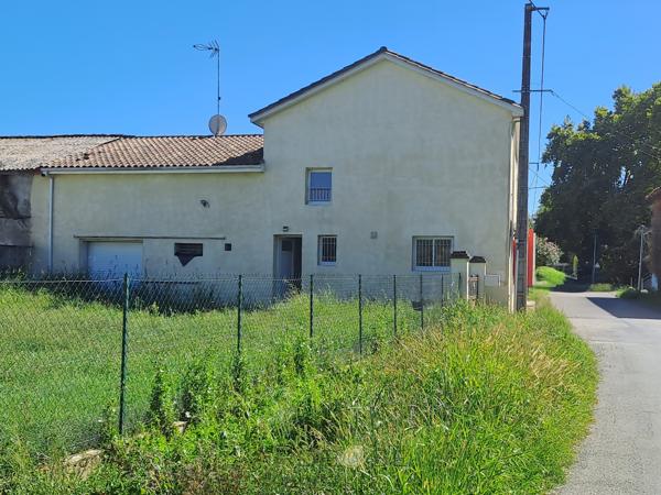 Maison rénovée avec 3 chambres, garage et jardin clos