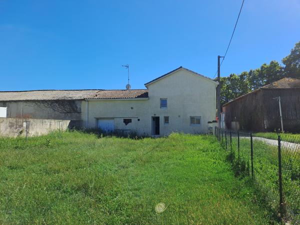 Maison rénovée avec 3 chambres, garage et jardin clos