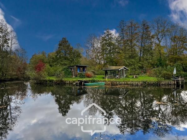 🌿 Terrain de loisirs avec étang – 11 110 m² – Maigné