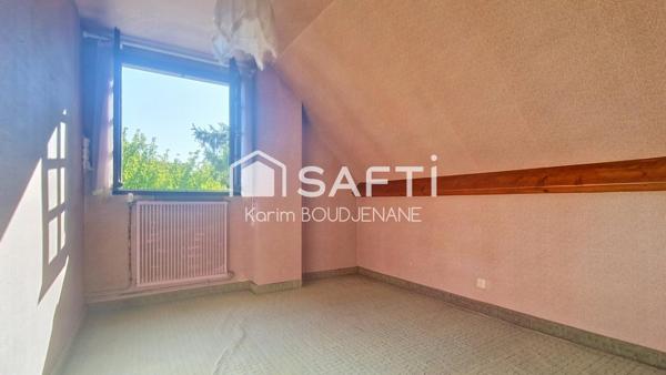 Maison familiale individuelle avec jardin de 864 m²