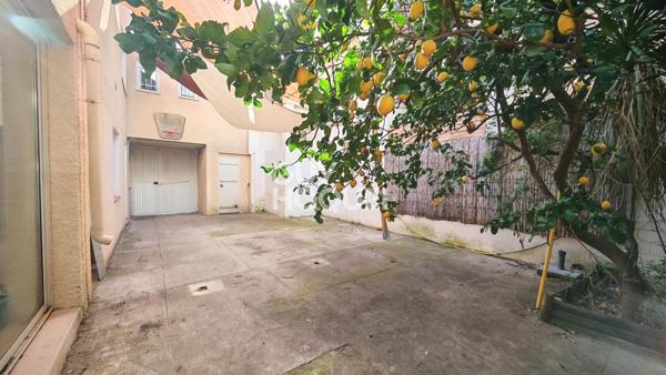 A vendre à PERPIGNAN Quartier de la gare, maison familiale 7 pièces avec terrasse, cour et parking