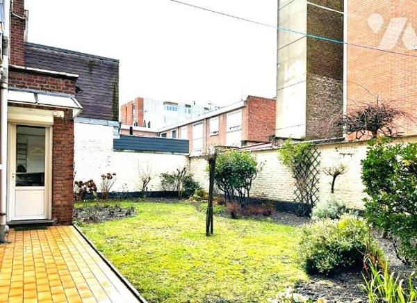 Coeur de ville, T3 en rez de jardin