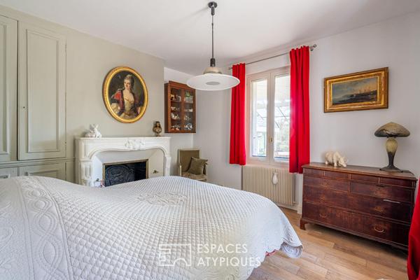 Maison de caractère nichée dans son domaine boisé