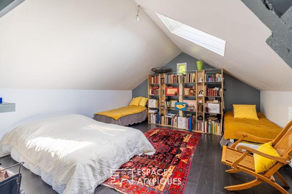 Maison de caractère nichée dans son domaine boisé