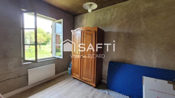 Ancien corps de ferme à rénover.