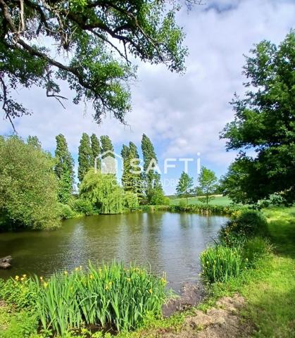 Belle propriété avec une maison des années 1950 et une longère aménagée en loft. Dépendances  avec boxes et plan d'eau et 1 hectare 7 de terrain