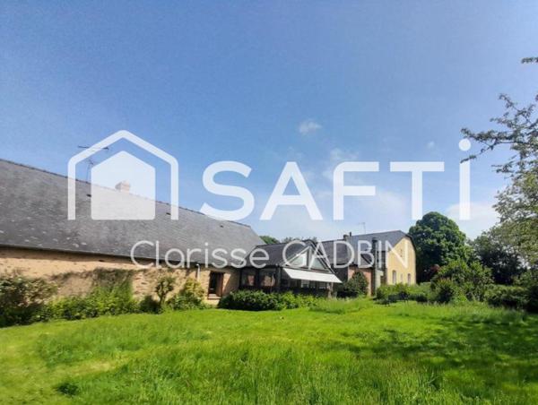 Belle propriété avec une maison des années 1950 et une longère aménagée en loft. Dépendances  avec boxes et plan d'eau et 1 hectare 7 de terrain