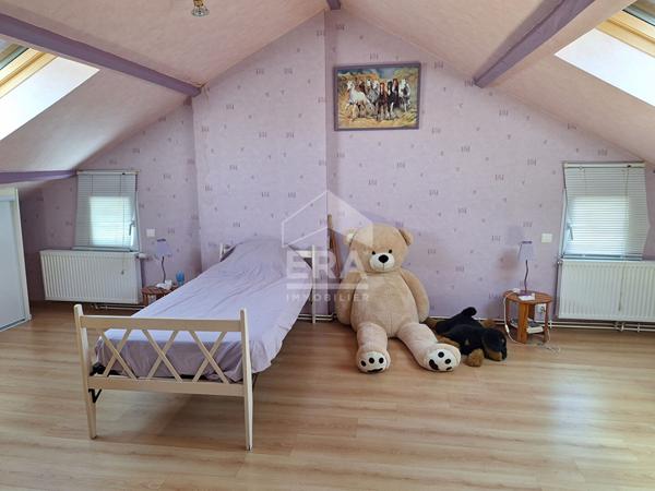 Maison individuelle avec grand garage à St Léon sur l'Isle.