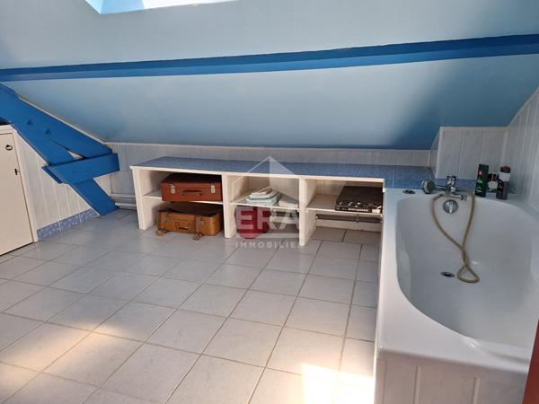 Maison individuelle avec grand garage à St Léon sur l'Isle.