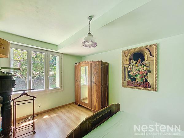 A Vendre Maison des années 1960 de 133 m² sur sous-sol avec jardin et garage de 64 m²